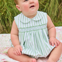 Little English traditional children's clothing.  Classic sleeveless smocked peter pan bubble with soft green and white stripes for baby boys