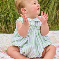 Little English traditional children's clothing.  Classic sleeveless smocked peter pan bubble with soft green and white stripes for baby boys