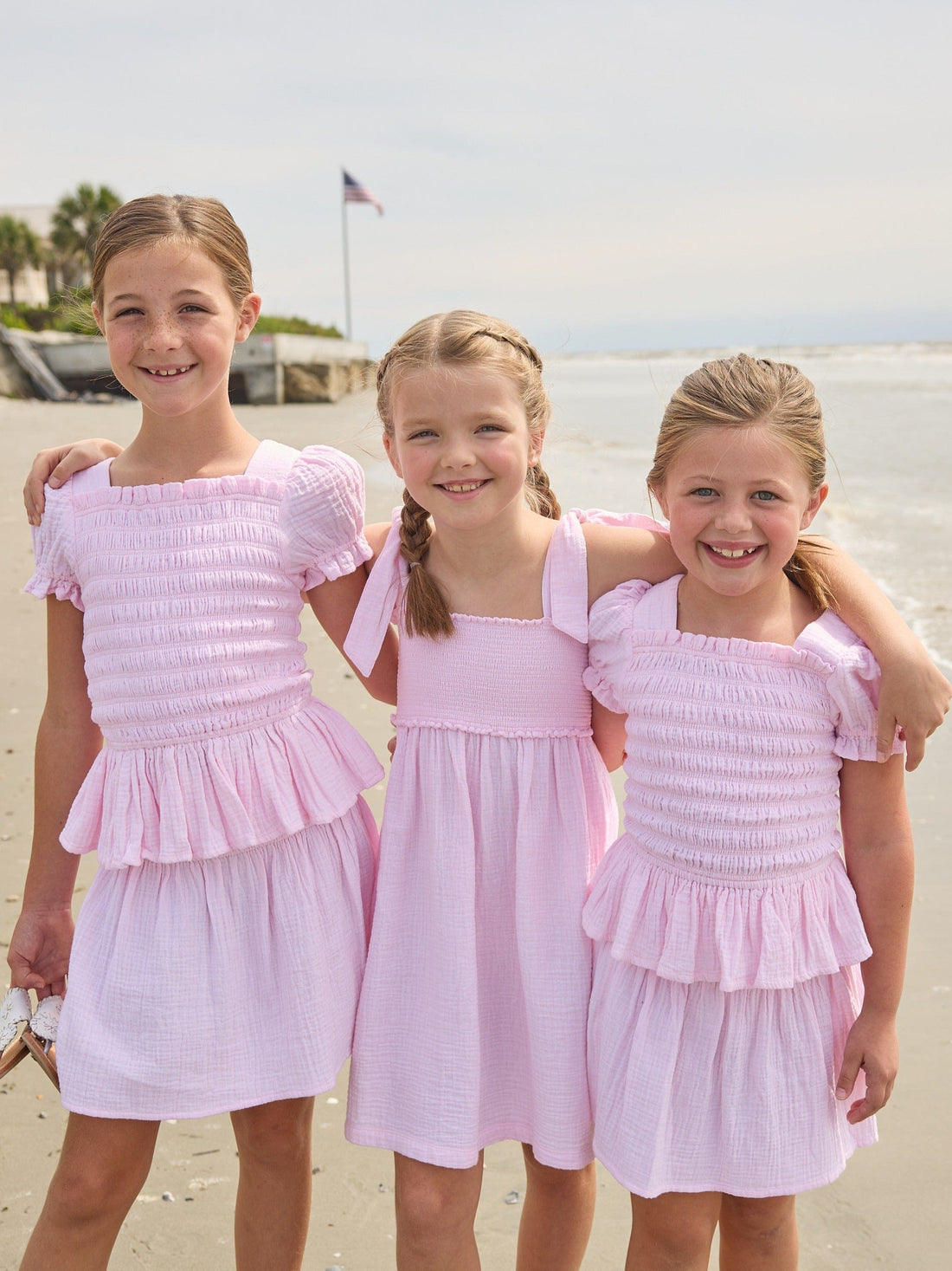 Little English classic isla top in jaipur pink with smocked details, isla skirt in jaipur pink, Leela dress with tie shoulders in jaipur pink, for little girls