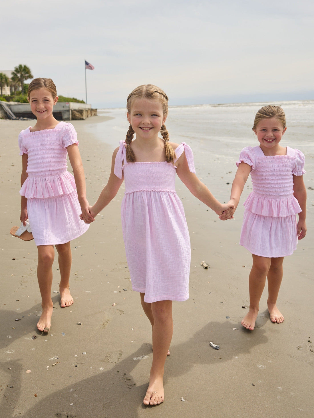Little English classic isla top in jaipur pink with smocked details, isla skirt in jaipur pink, Leela dress with tie shoulders in jaipur pink, for little girls