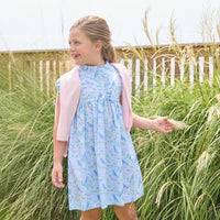 Little English traditional children's clothing.  Light blue dress with blue bird and cherry blossom print for little girls