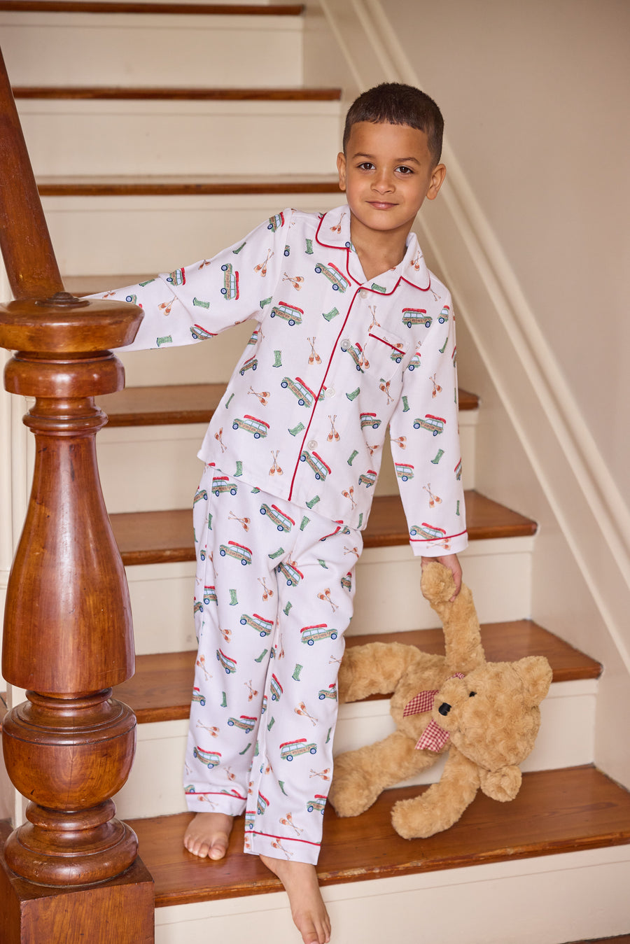 little english classic children's clothes,  boys wagoneer pajama set with a cream background and red piping 