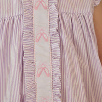 Little English traditional children's clothing. Classic dress for toddler girls in lavender stripe seersucker with peter pan collar and ballet slipper embroidery