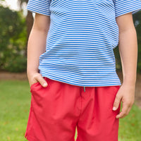 Little English traditional children's clothing.  Classic royal blue striped polo for boys for Spring. Sport short in red twill. 4th of July shirt for boys