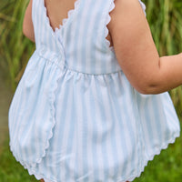 Little English traditional children's clothing.  Light blue and white striped two-piece for baby girls with white ricrac trim