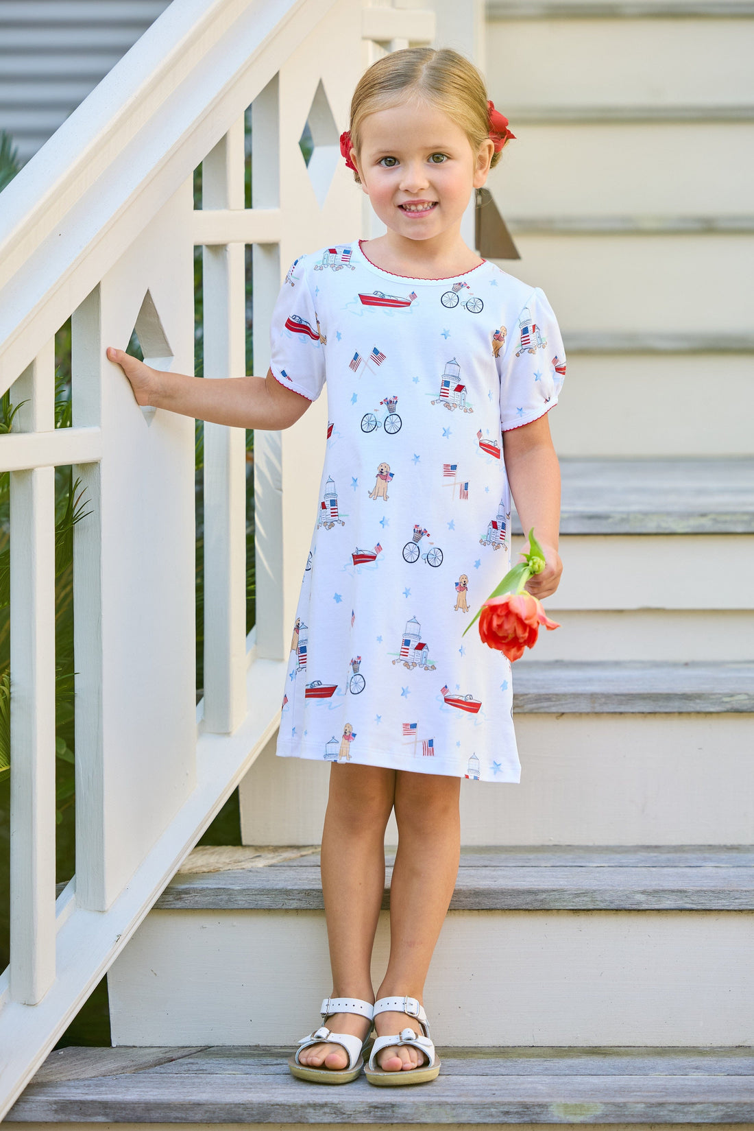Little English classic printed T-shirt dress with puppy, flag, boat, bike, lighthouse, and star motifs for fourth of july, for little girl