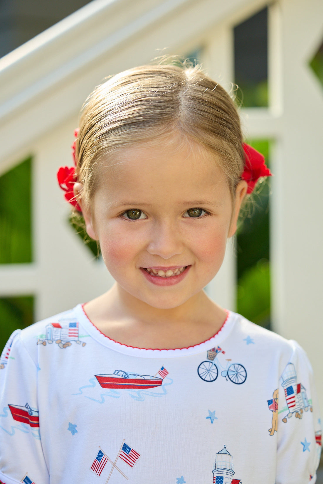 Little English classic printed T-shirt dress with puppy, flag, boat, bike, lighthouse, and star motifs for fourth of july, for little girl