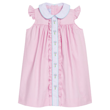 Little English traditional children's clothing.  Ruffled light pink dress with palm trees for toddler girl for Spring.