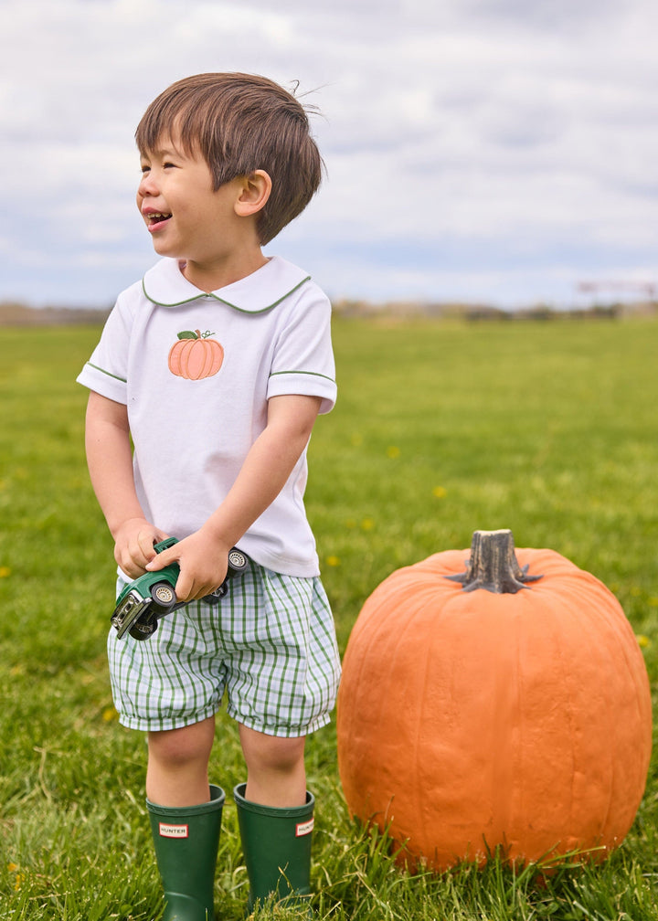 Little English classic short set for little boys.  White knit peter pan shirt with applique pumpkin at the center and coordinating banded shorts in green Leland Plaid.  
