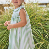 Little English traditional children's clothing.  Classic sleeveless smocked peter pan dress with soft green and white stripes for little girls