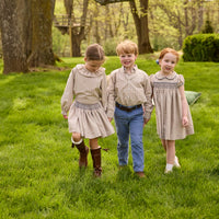 Little English traditional children's clothing. Long sleeve blouse with ruffle collar in blue and tan Durham Windowpane for girls