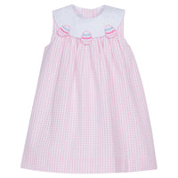 Little English traditional children's clothing, girl's light pink seersucker check dress with Easter egg applique on the bib collar for Spring