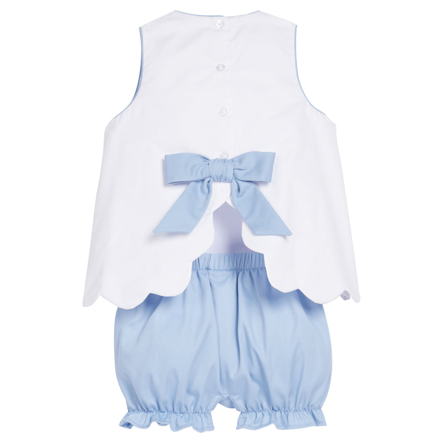 Little English traditional children's clothing. Sleeveless white scallop top trimmed in blue with light blue bow in the back.  Paired with light blue ruffled bloomers.  White and light blue bloomer set for baby girl for Spring.