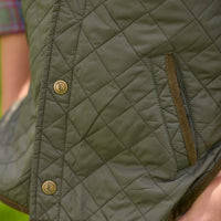 Little English traditional children's clothing.  Classic quilted vest in olive with corduroy detailing.  Unisex vest for kids