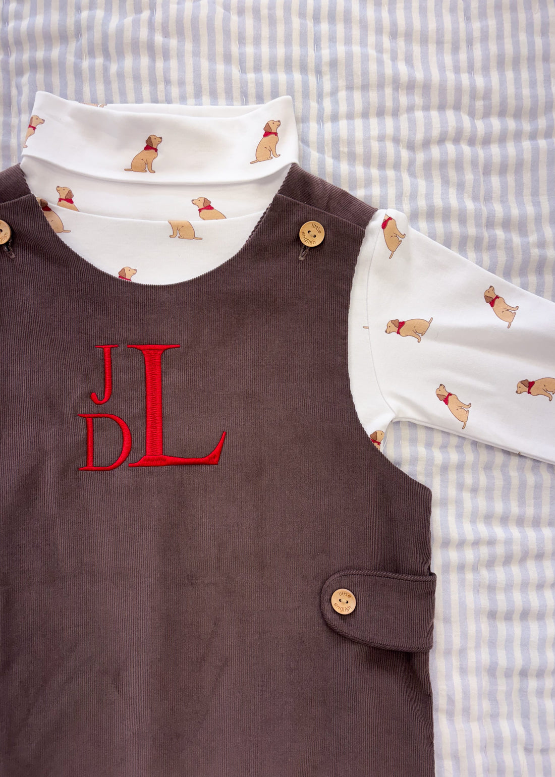 Little English classic printed turtleneck with seated labs paired with a chocolate corduroy john john for toddler boys