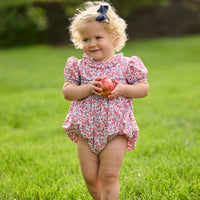 Little English traditional children's clothing.  Soft blue and raspberry red Lennox Floral short sleeve bubble for baby girls with ruffle collar and blue piping detail at sleeves and chest