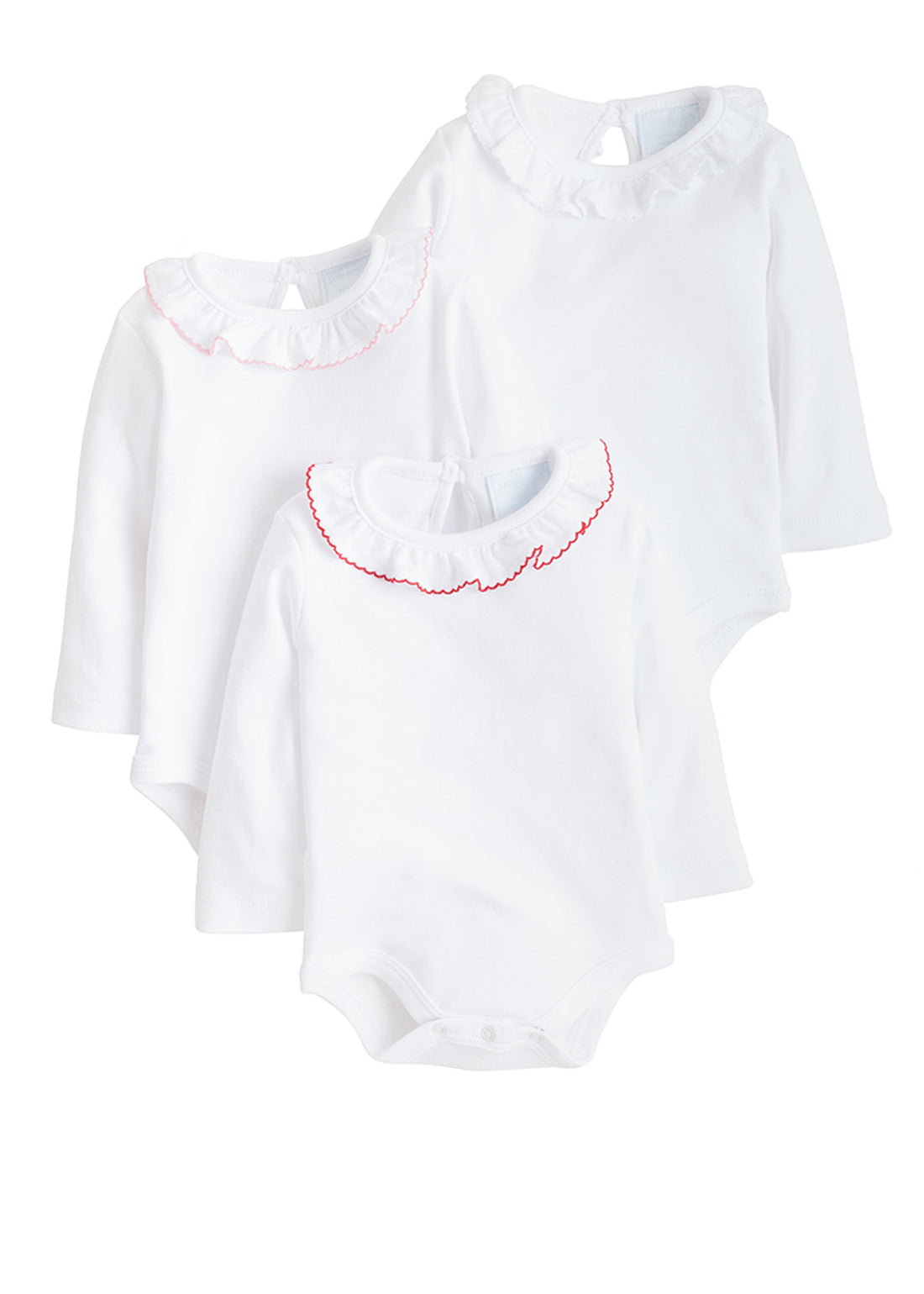 Caroline Knit Onesies in light pink, white, and red