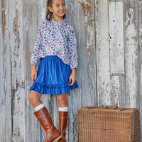 Little English tween girl classic woven blue and red floral on white blouse with long sleeves and cinched neckline