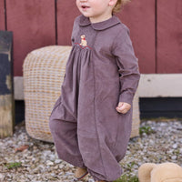 Little English traditional children's clothing.  Chocolate brown corduroy romper for baby boys with peter pan collar and lab smocking at the chest