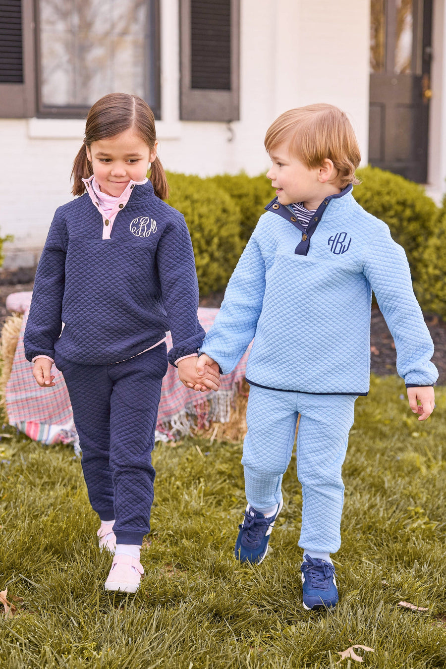 little english classic quilted pullovers in navy and light pink and in light blue and navy, quilted joggers in navy and light blue