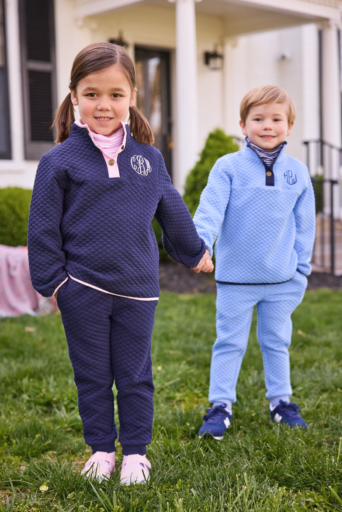 little english classic quilted pullovers in navy and light pink and in light blue and navy, quilted joggers in navy and light blue