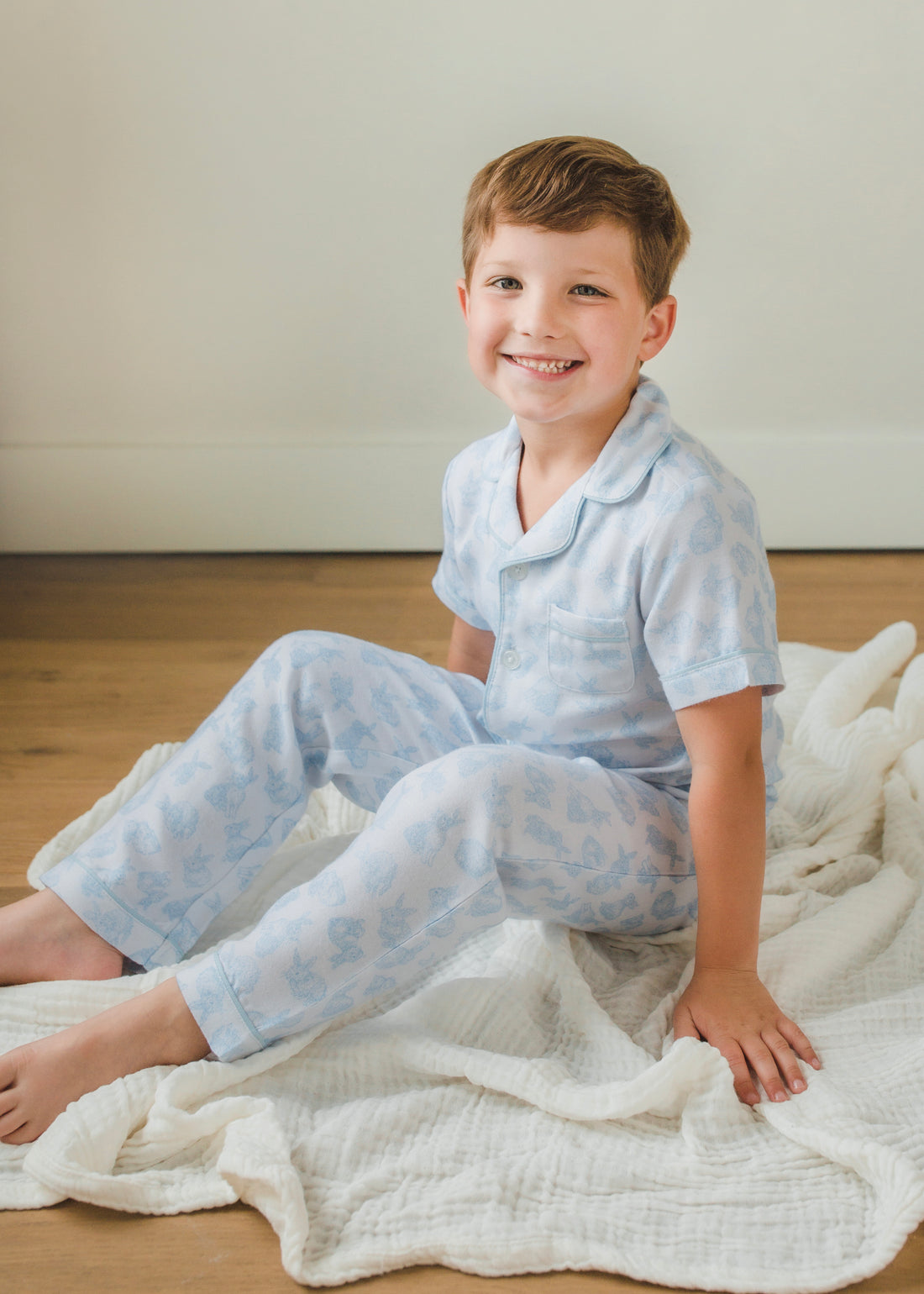 Little English classic kids short-sleeve flannel style pajama set, traditional jammies with blue bunnies for Spring