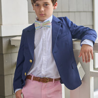 Little English classic wool blazer in navy, button down shirt in white oxford, classic pant in light pink twill, bow tie in mayfair gingham, for little boy 
