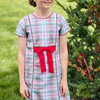 Little English classic children's clothing. Girls A-line dress in red and green plaid with red bow and red piping detail for the holidays