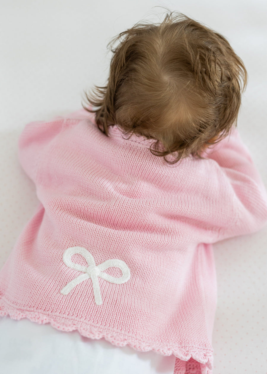 Pink Crochet cardigan for baby girl with white bow motif, Little English classic baby girl's sweater