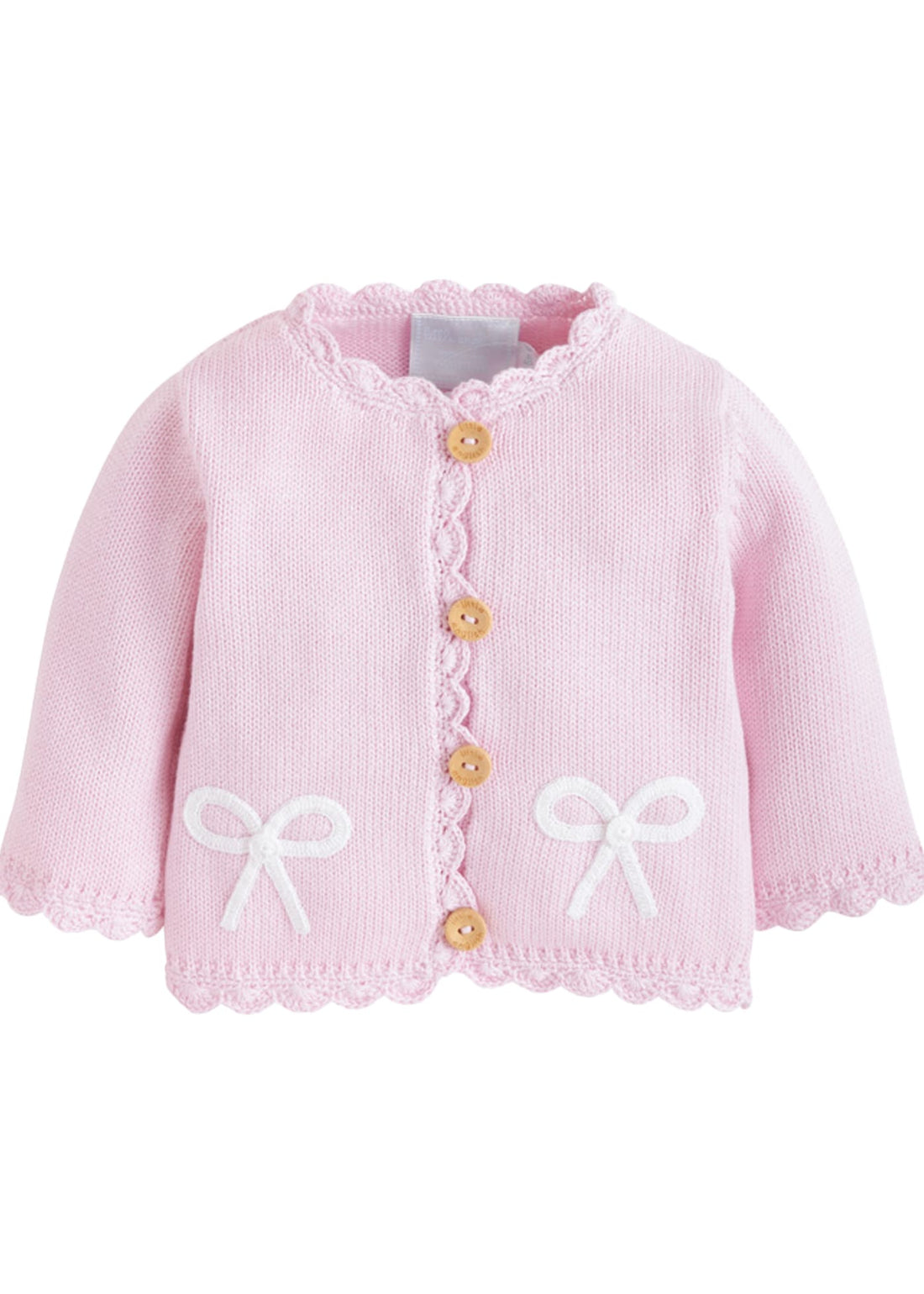 Little English traditional baby clothing, signature light pink crochet sweater with white bow for baby girl