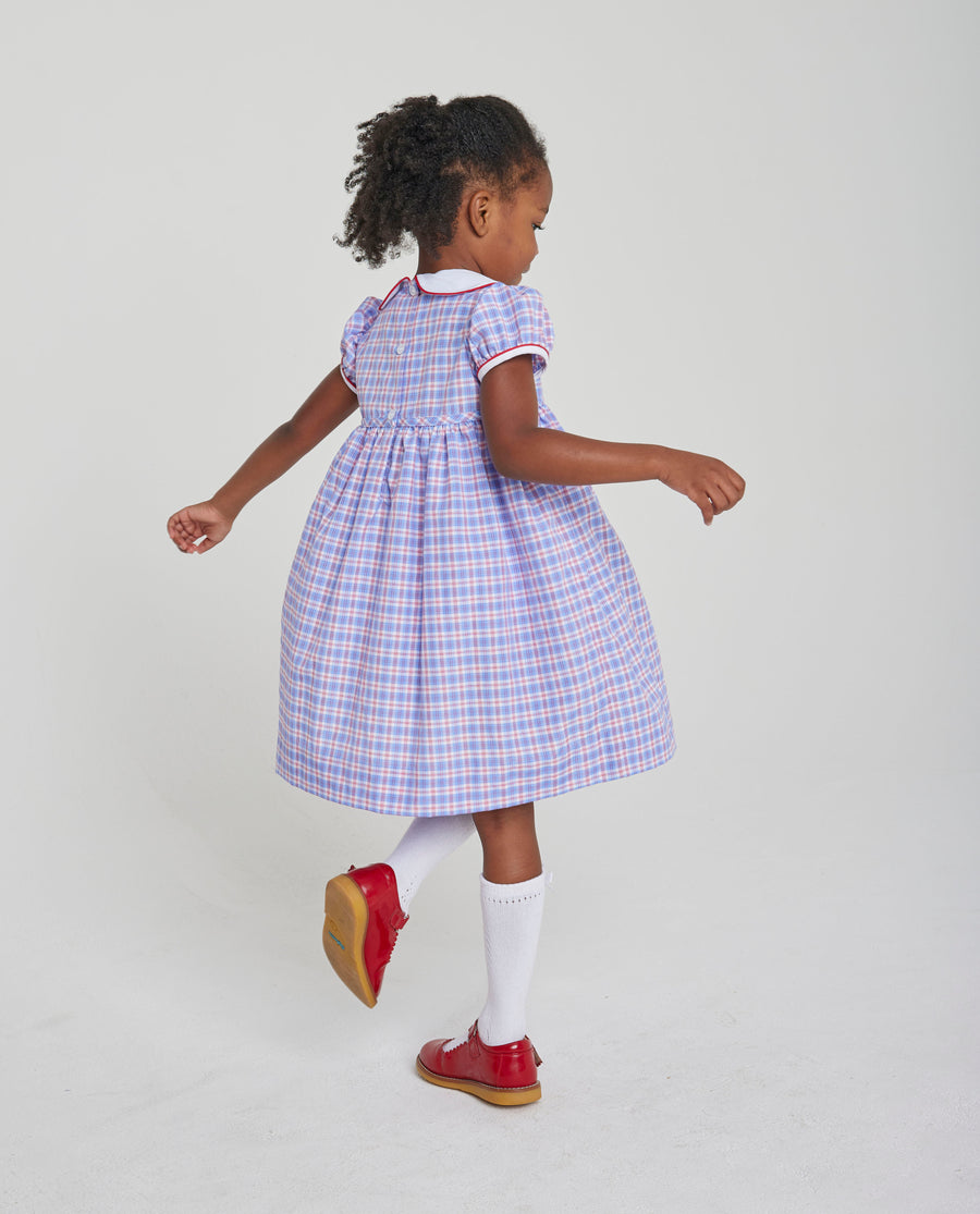 Little English traditional girl's plaid dress for fall with peter pan collar and red bow