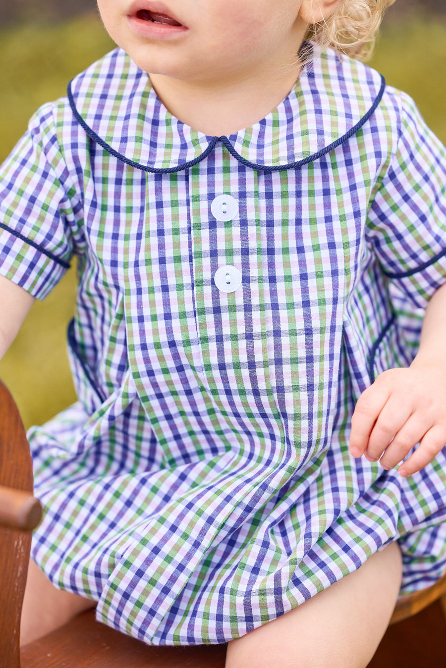 little english classic children's clothing; green, purple, and white plaid bubble for boys with peter pan collar, navy corduroy trim, and button tabs for fall 