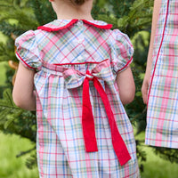 Little English classic children's clothing. Toddler girls puff sleeve dress in red and green plaid with ruffled peter pan collar and bow tie sash in back.