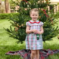 Little English classic children's clothing. Toddler girls puff sleeve dress in red and green plaid with ruffled peter pan collar and bow tie sash in back.