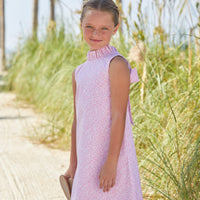Little English classic knee length dress with pink floral pattern and bow in back, traditional girl's dress for spring