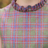 Little English traditional children's clothing. Olive and maroon Thornhill Plaid column dress with capped sleeves, ruffled neckline, and fixed bow in back for older girls for the holidays