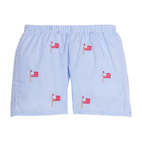 Little English traditional children's clothing.  Blue gingham shorts with all-over American flag embroidery for boys.  Boy's shorts for 4th of July.