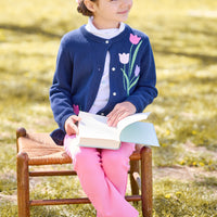 little english classic children's clothing, girls navy cardigan with pink and purple embroidered tulips, turtleneck with tulip print, kick flare leggings in hot pink, girls outfit for fall 
