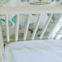 Little English classic nursery goods for baby, white crib sheet with simple light green embroidery along the edges for baby