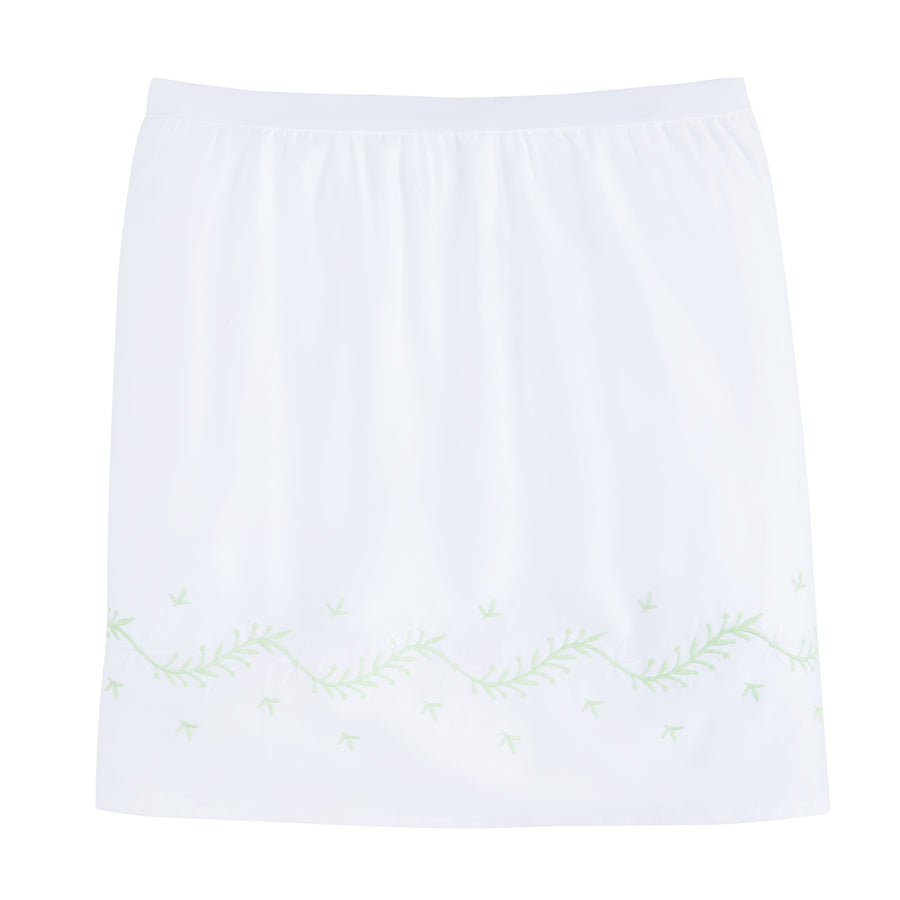 Little English classic nursery goods for baby, white crib skirt with simple light green embroidery along the edges for baby