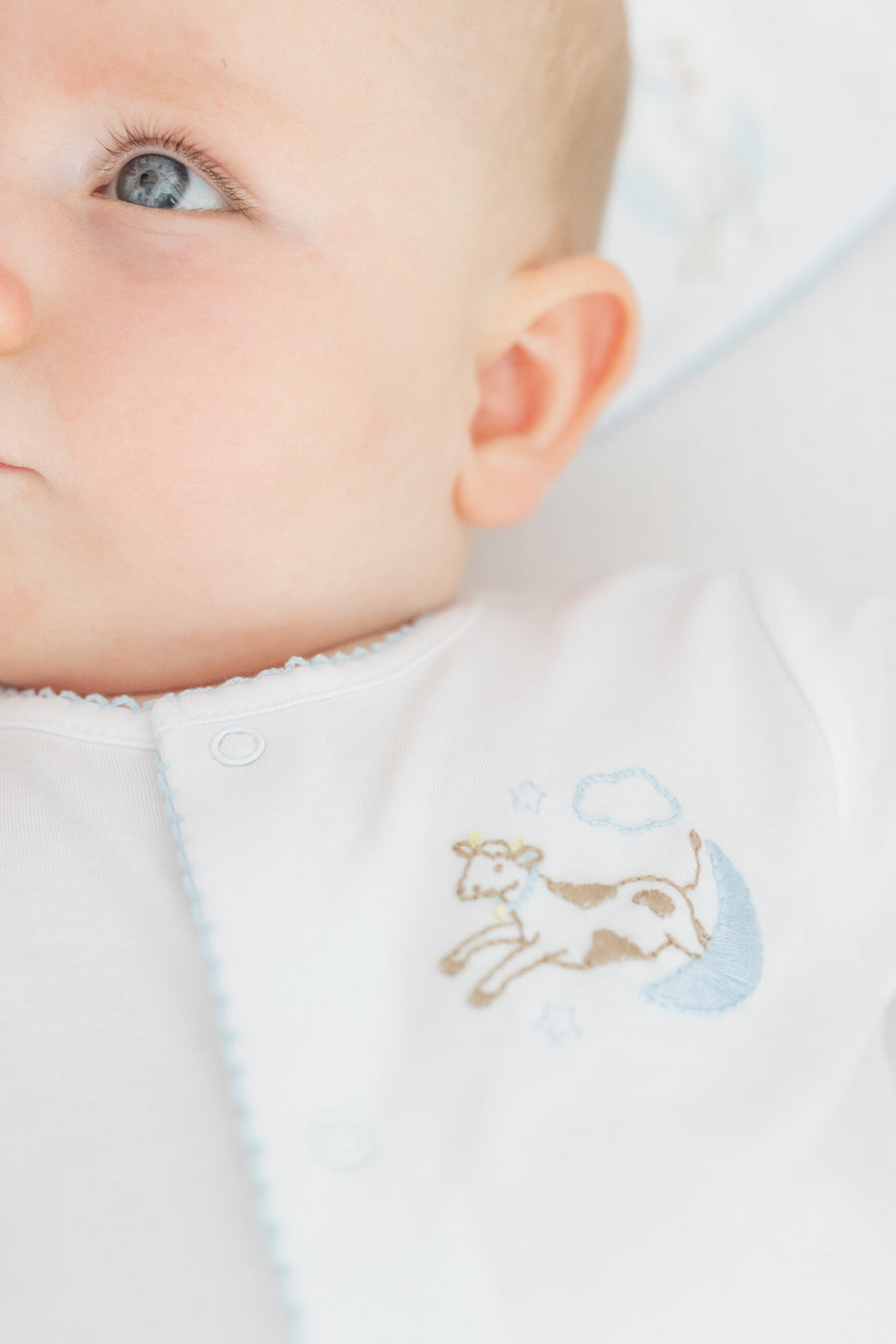 little english classic children's clothing white footie with cow and moon embroidery with light blue picot trim for baby boy 