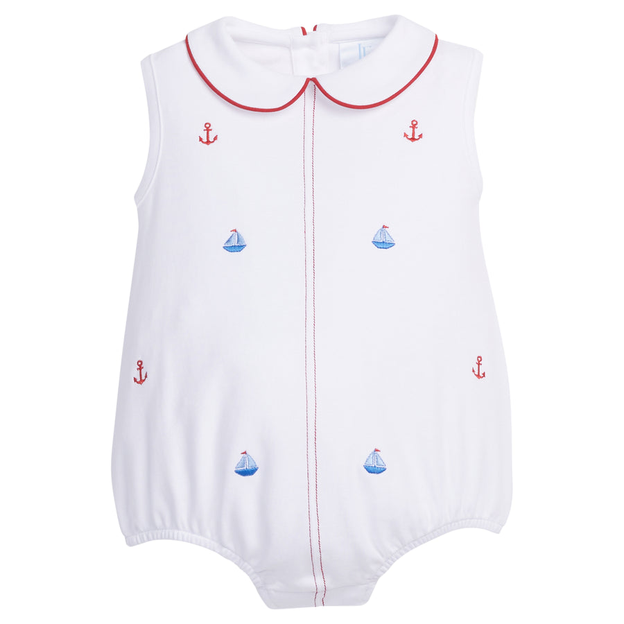 Little English traditional children's clothing, baby's sleeveless white knit bubble for Summer, with embroidered sailboats and anchors and red piped peter pan collar