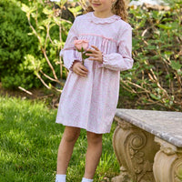 Little English traditional children's clothing. Long sleeve pink and green Windemere floral dress with ruffled collar and fixed bow detail for little girls