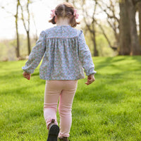 Little English traditional children's clothing. Long sleeve pink, aqua, and green Fondren Floral cotton knit top with pink piping detail for little girls. Paired with classic light pink leggings.
