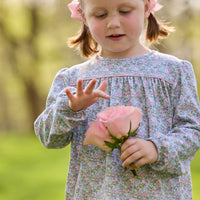 Little English traditional children's clothing. Long sleeve pink, aqua, and green Fondren Floral cotton knit top with pink piping detail for little girls. Paired with classic light pink leggings.