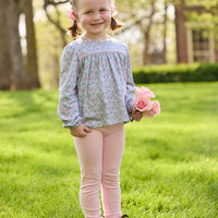 Little English traditional children's clothing. Long sleeve pink, aqua, and green Fondren Floral cotton knit top with pink piping detail for little girls. Paired with classic light pink leggings.