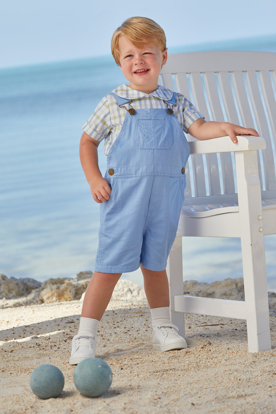 Little English traditional children's clothing, light blue twill short overall for toddlers for spring with brass hardware