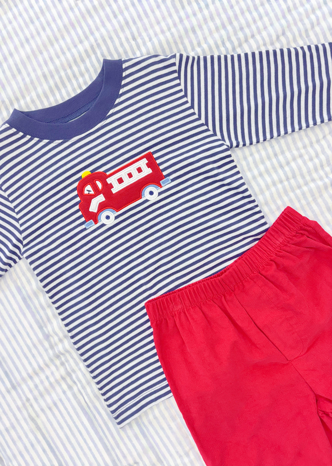 Little English long sleeve navy and white striped t-shirt with red fire truck applique paired with red corduroy pants for fall