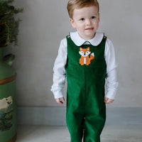 Little English boy's hunter green corduroy overall with fox applique and wooden buttons at the shoulder