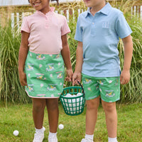 Little English traditional children's clothing.  Classic green twill skort with golf cart print and pink trim for girls.